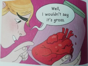 Mason Mooney gazes lovingly at a heart in a jar, reaching out his finger in an affectionate pose. Speech bubble reads "Well, I wouldn't say it's gross."